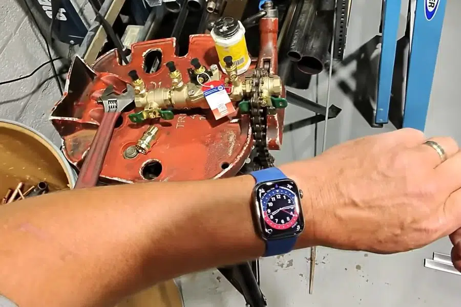 Gas line valve and water heater piping connection being checked related to Gas line pressure test in Monrovia