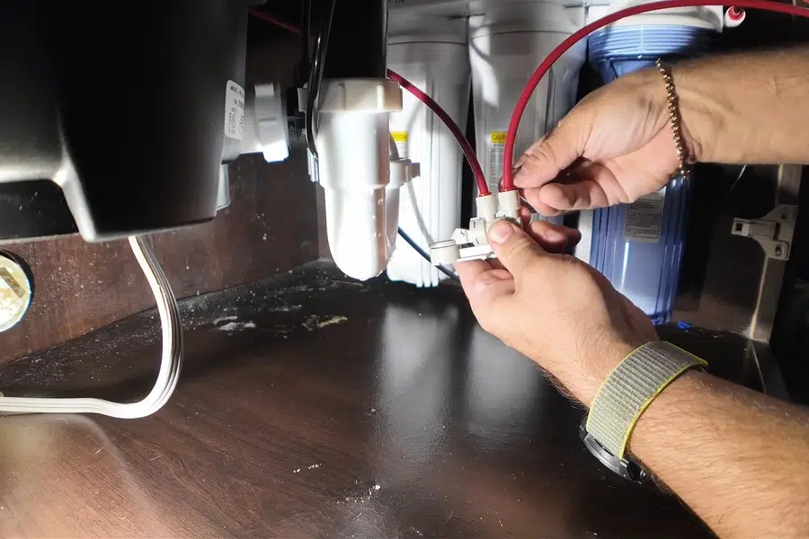Garbage disposal mounted below a kitchen sink drain related to Disposal wiring and drain connection in Monrovia